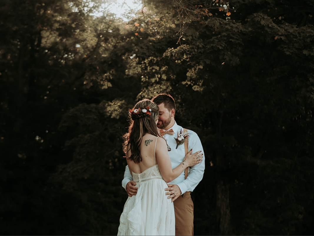 a wedding photo with the couple with their "first dance"