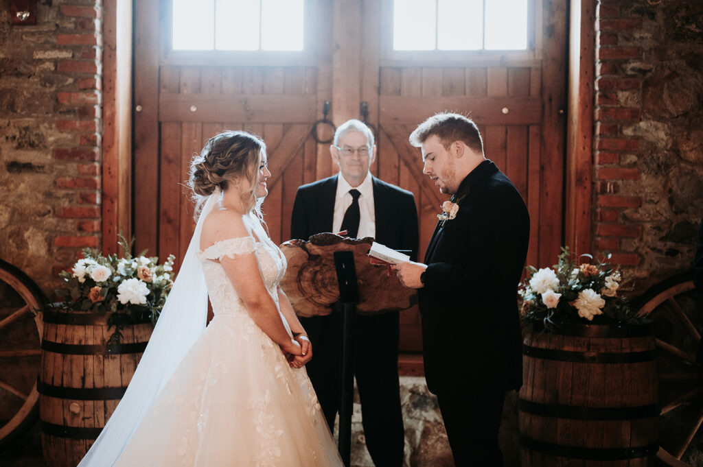 wedding photo of the couple exchanging vow