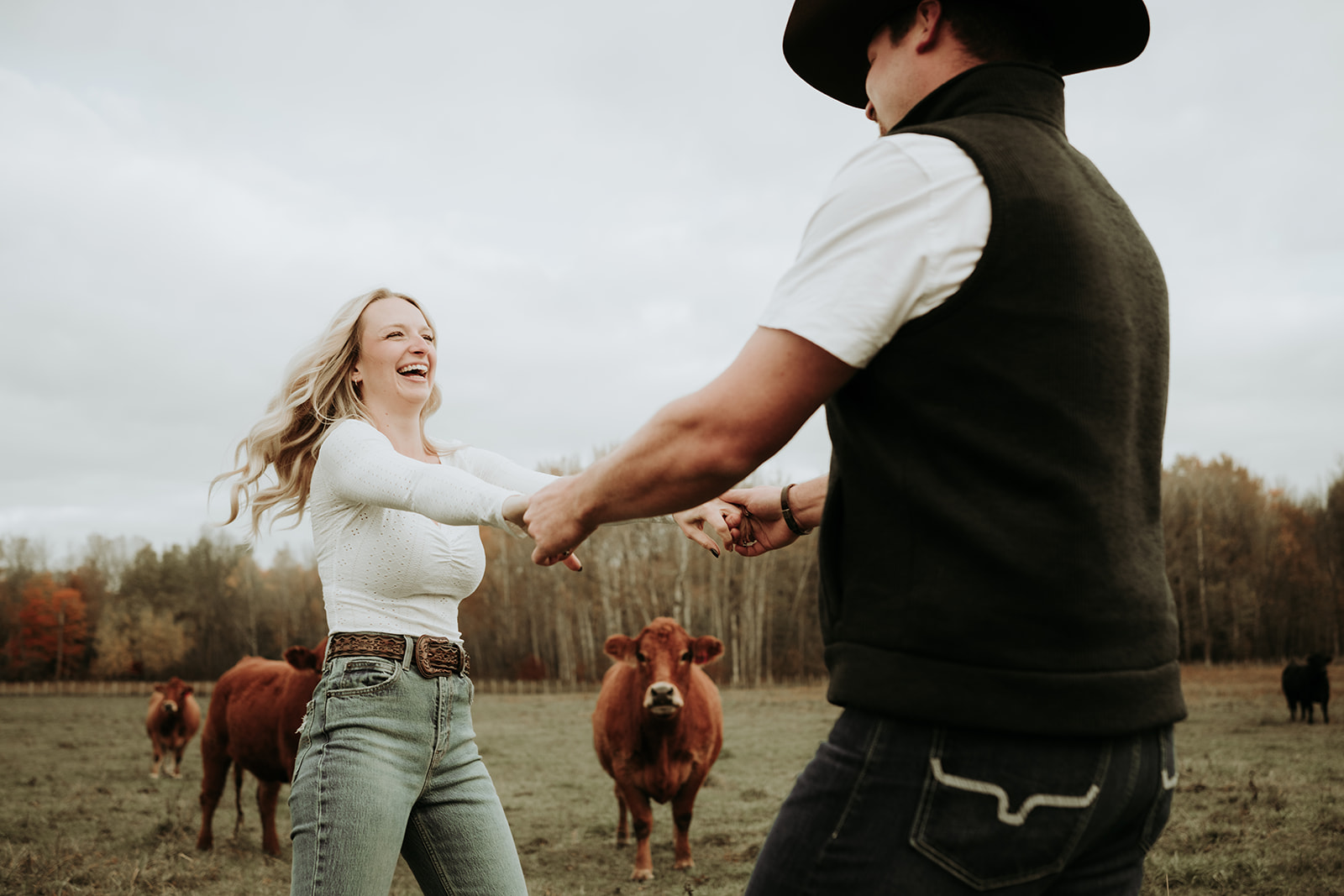 couple pose: couples are holding both hands and spinning together.