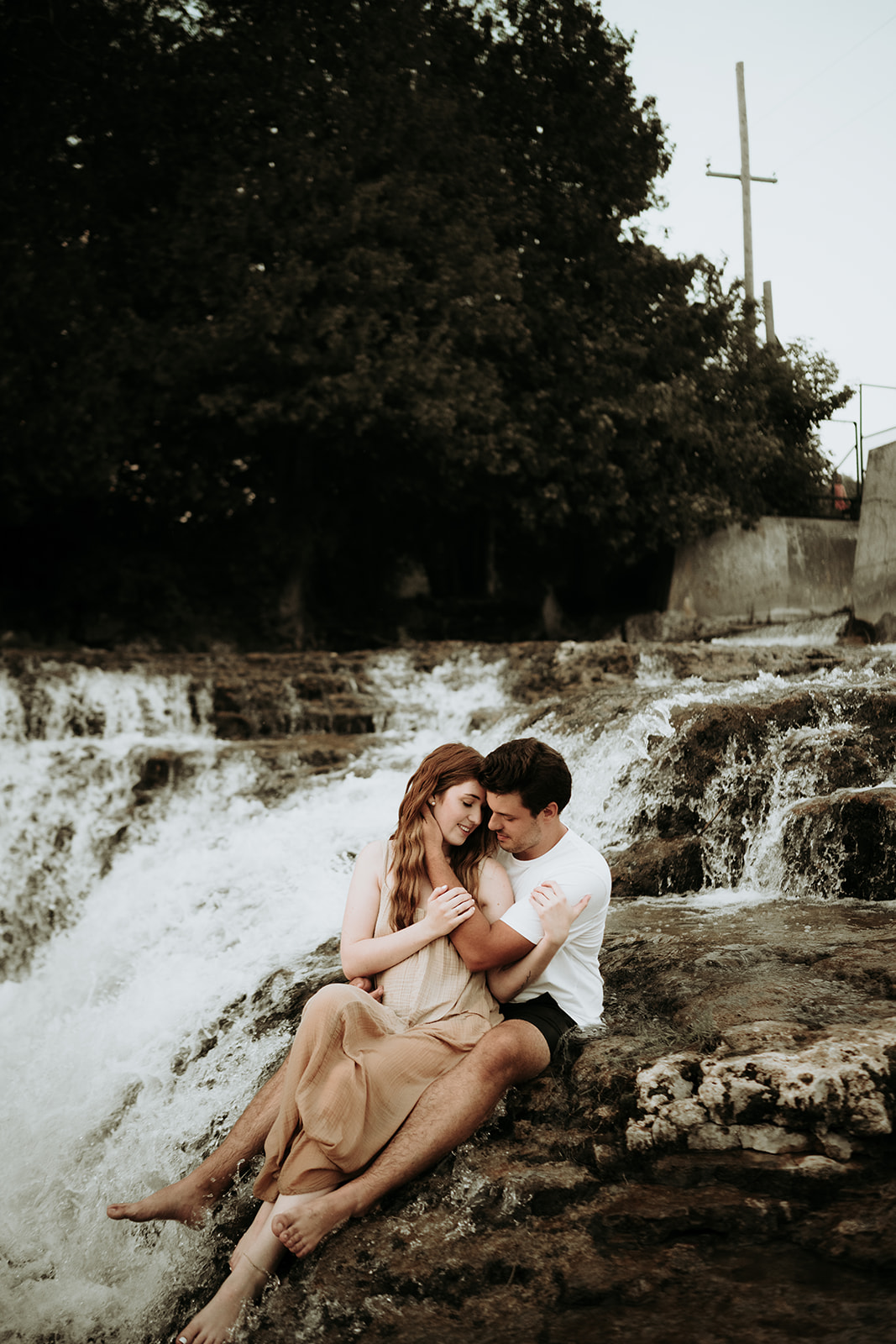 couple pose: couple gently touch foreheads with their eyes closed.