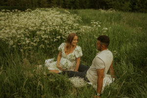 Pregnant couple during sunrise maternity photoshoot in Grey Bruce, Ontario